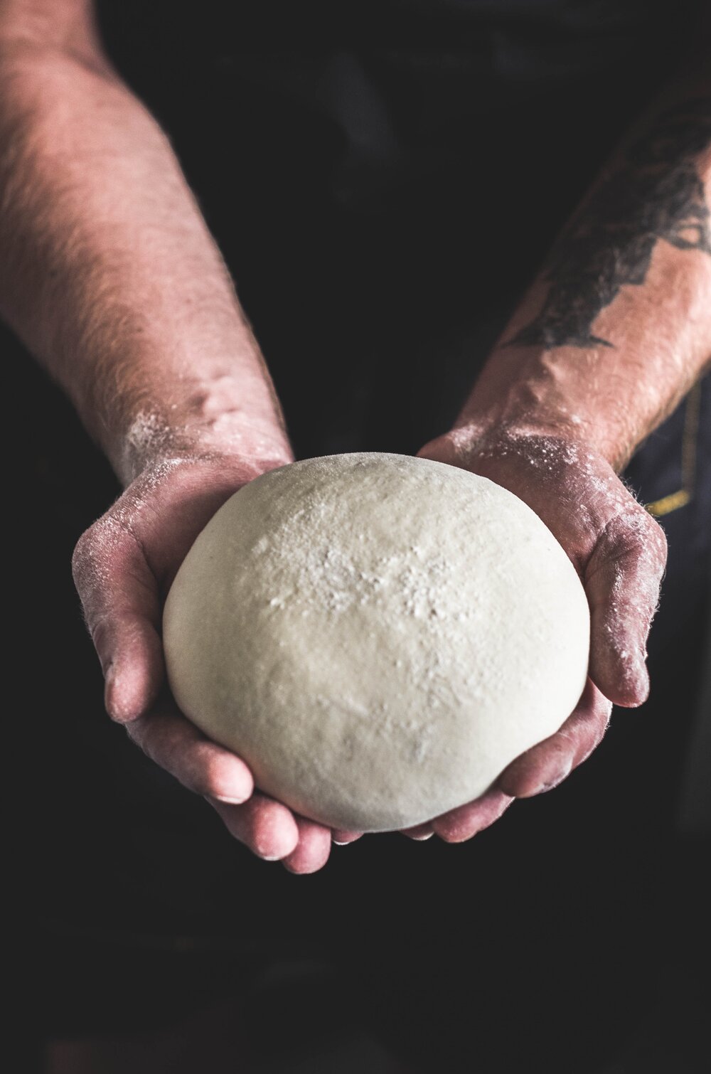 dough ball in hands