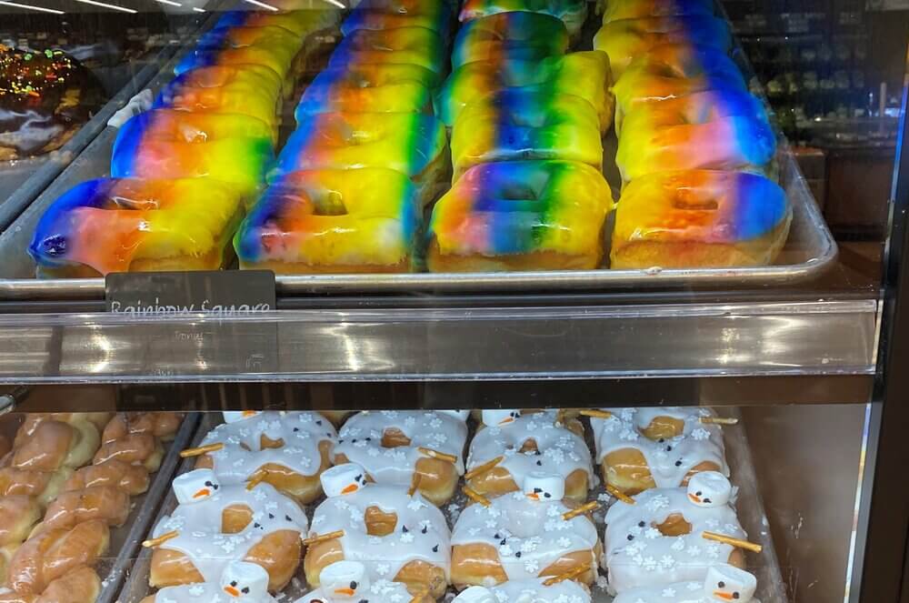 rainbow sprayed and melted snowman